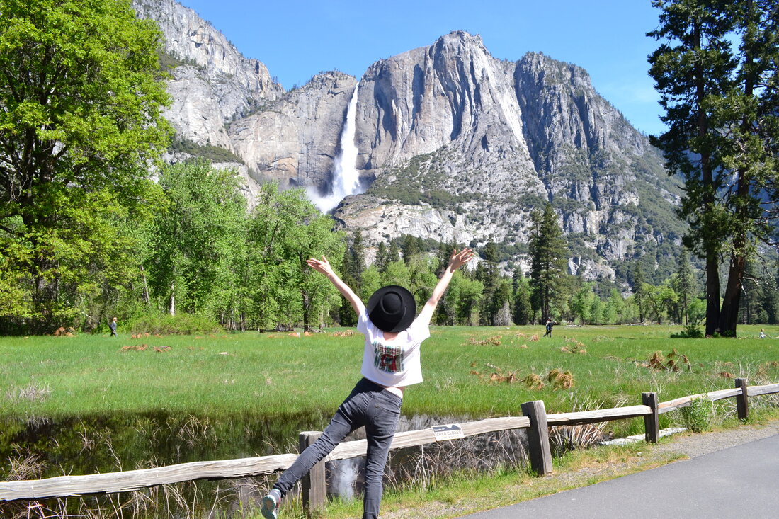 A Picture of the author standing in front of Upper Yosemite Falls in Yosemite